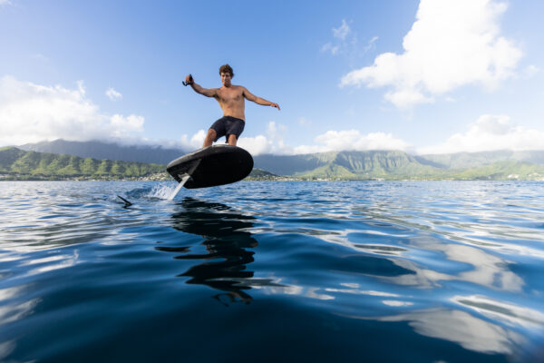 Fliteboard ULTRA: A sleek and powerful electric hydrofoil surfboard, effortlessly gliding above the water's surface, offering an exhilarating and thrilling ride with its advanced technology and impressive speed.