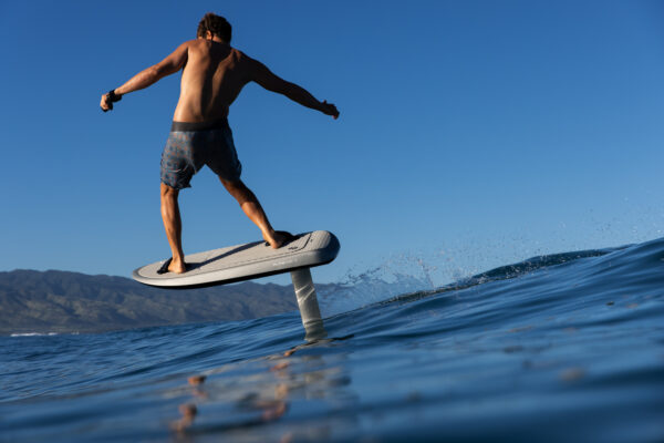 A Fliteboard ULTRA in action, capturing the pure adventure of the ride. Its sleek design and powerful performance on full display. Experience the exhilarating thrill and adrenaline rush of hydrofoil surfing with the Fliteboard ULTRA, a gateway to unforgettable adventures.