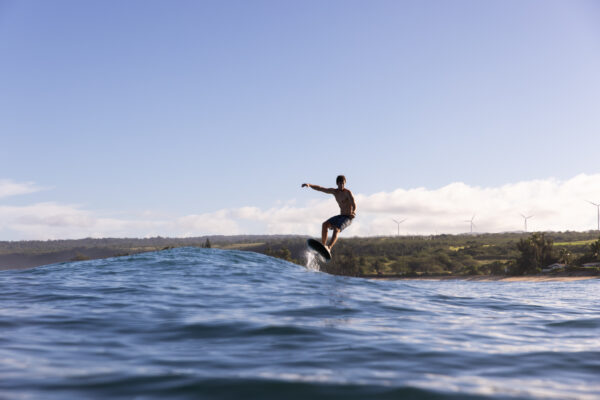 An adrenaline-filled ride on the Fliteboard ULTRA as a man surfs the waves with grace, capturing the essence of exhilaration and freedom.